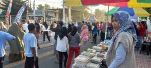 Berkah jalan sehat IKA Unram Dompu bagi UMKM, duit puluhan juta beredar di arena CFD